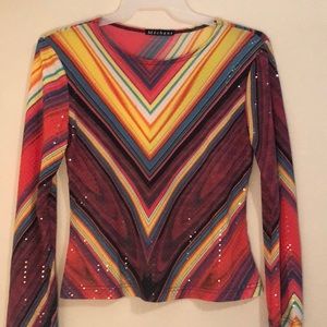 Merchant rainbow sequences shirt.
